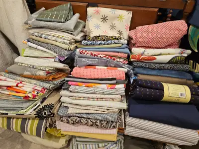 Hundreds of metres of fabric. Much of it is double wide and heavy for curtains. And much of the rest...