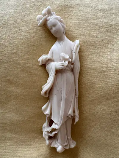 This delicate vintage-style Asian-inspired figurine showcases elegant craftsmanship and fine detaili...