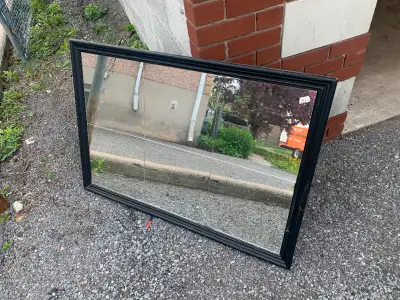 Wall mirror in good condition, no cracks or chips, measurements 39 1/2" x 27 1/2" located in Westbor...