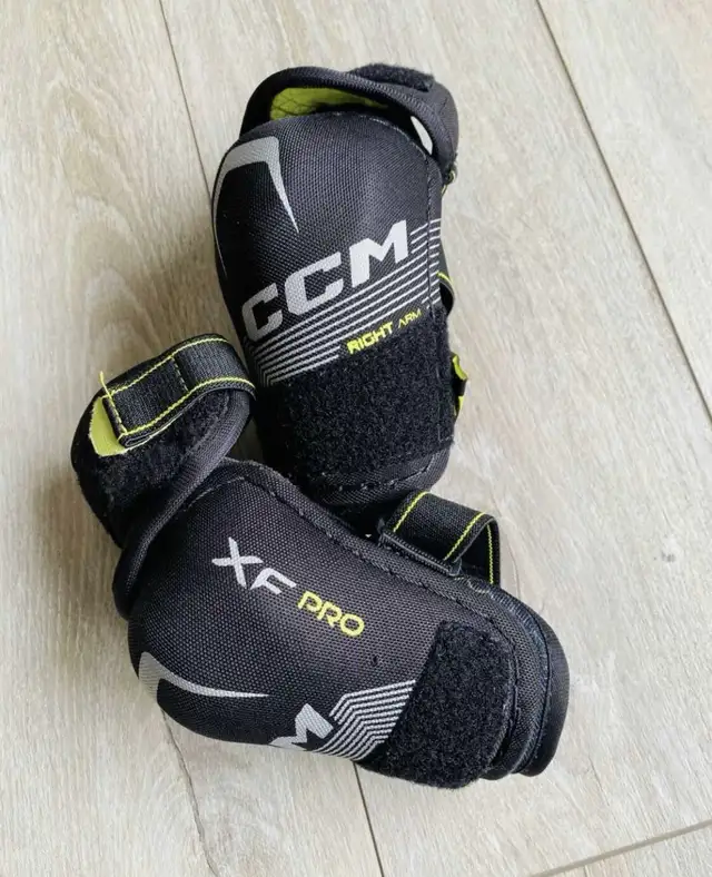 CCM hockey elbow pads-youth large in Hockey in Calgary - Image 2