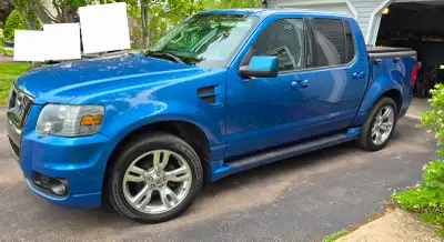 2010 blue Ford Explorer Sport Trac Adrenalin with 177 000 Km. Bought new in 2010, 1 owner. No accide...