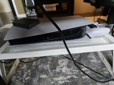 Gently used PS5 bundle with 12 top games, View more