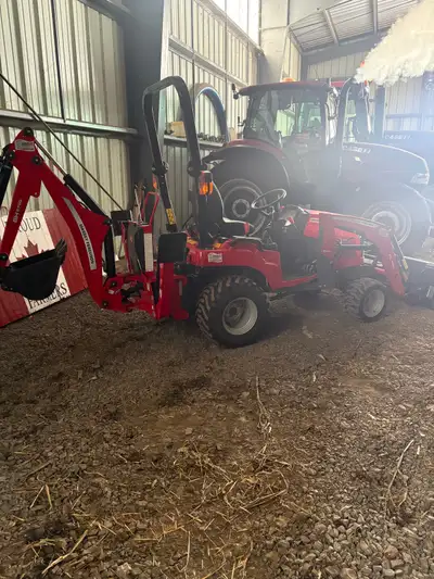 Massey Ferguson E compact tractor for sale Comes with front end loader, backhoe and mower deck that...