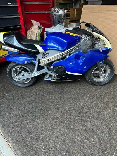 Zoom around town on this super fun blue pocket bike! It is in used condition, but still runs great!...