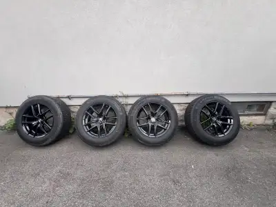 Selling a set of used Lexus wheels with Michelin X-Ice Snow SUV tires, sized at 235/65R18, perfect f...