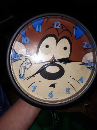 98' Taz clock working , View more