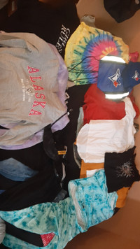 Assortment of kids clothing. Ages 8-10