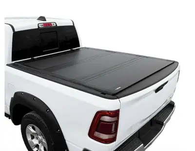 Used hard folding tonneau truck cover for a 6ft box, folds in 3. 5 years old, from a F-150 truck. $3...
