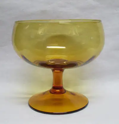 large very decorative amber glass footed bowl size is 6,5" high x 6,5" in diameter across top