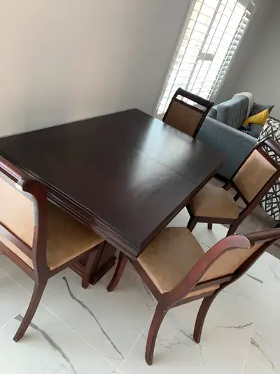 Selling this custom made dining table Comes with the middle piece to make the table longer. Selling...