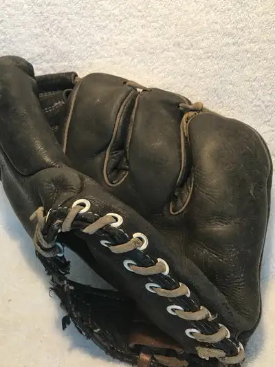 In good used condition a Victor Sporting Goods Company Black Leather Baseball Glove, 1940’s to 1950’...