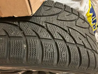 Winter tires on custom rims only used one season and were only driven on four times, they come with...
