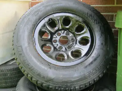 4 Michelin winter truck tires. Size 265-170-R17. Come with 6 stud hole steel rims. Used on a 2005 GM...