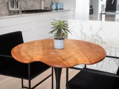 Brand new, hand crafted dining table. Although this table is round, it has been hand-sculpted to giv...