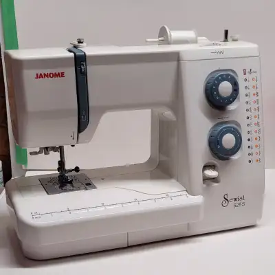 Janome Sewist 525S. This model is a mechanical, top loading sewing machine. It is user friendly with...