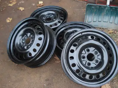 4 - 17 inch steel rims . Fits Gm Equinox 2010-2017 and maybe others. 5-120 bolt pattern