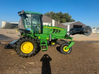 2014 W150 John Deere Swather with 430D Header. (Always Shedded) Loaded with all the options. cross a...