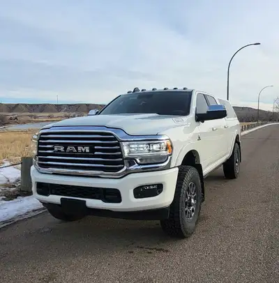 2019 Ram 2500 Longhorn crew cab. Low mileage, 71,000km. 6.7 Cummins Diesel (emissions removed since...