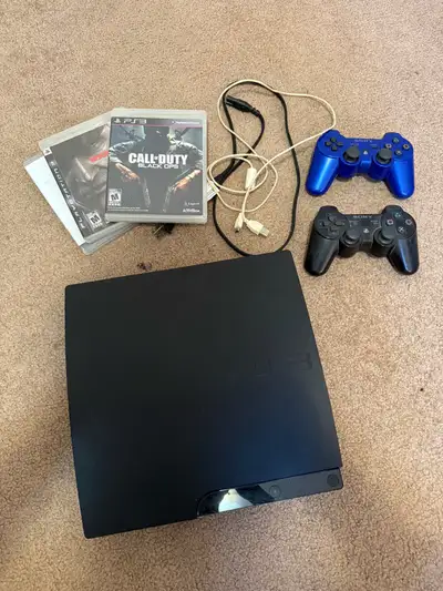 PS3 with two controllers. 3 games, black ops 2, GTA San Andreas and MGS4