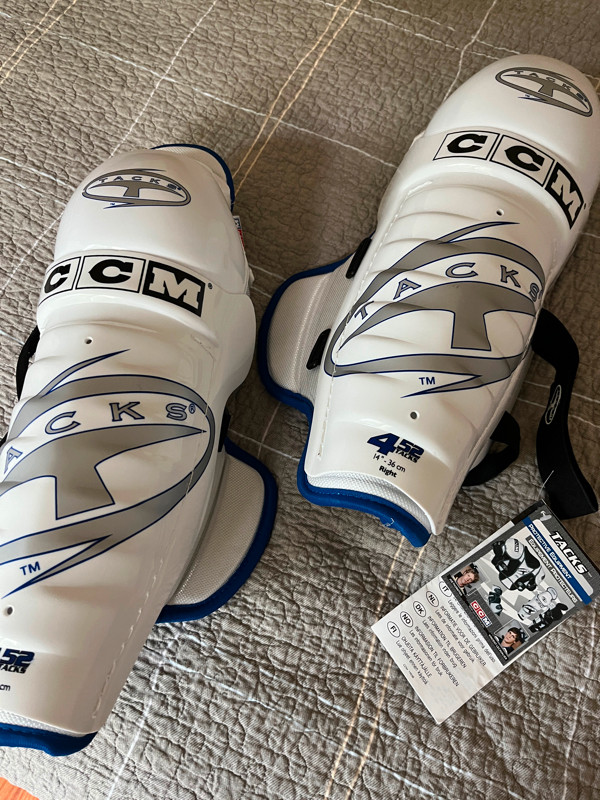 Shin Pads - CCM 14 inch - New with tags in Toys & Games in North Bay