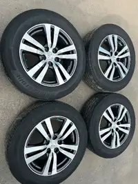 18” Honda alloy rims and tires. $1000obo