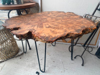 Live edge wooden  table with steel legs