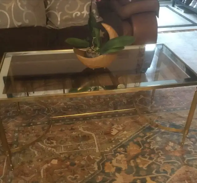 Gold coffee table with glass top L 39” X H 18” X D 19.5”63782599614721124