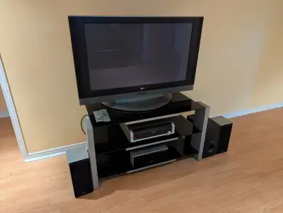 LG 42 Inch Plasma TV With Glass Stand And Pioneer Sound System, View more