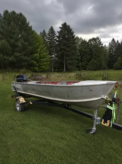 14' Aluminum Boat with trailer and 18hp Mercury. Boat floats great no leaks at all.Trailer hauls gre...