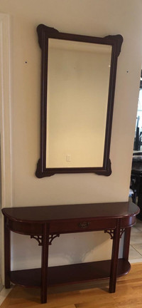 Mahogany Colour Gently used entrance mirror and wall table set.