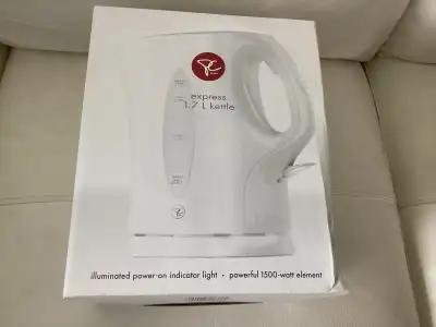 White cordless kettle, New in box. Sits on plug-in base, View more