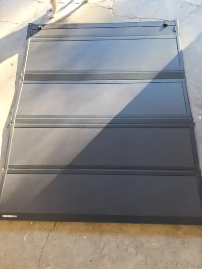 6'4" tri-fold tonneau cover, with tracks, from a 2019 Dodge RAM 1500 sport/rebel. Only on the truck...