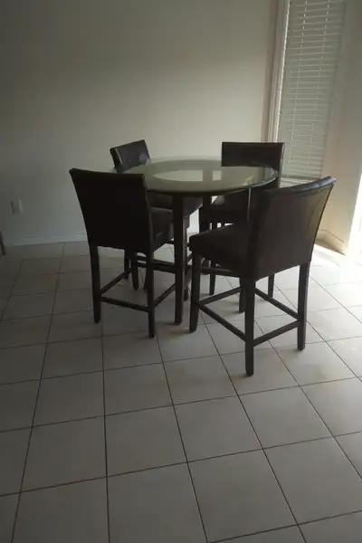 Crate and Barrel 42" Round Glass Table Beveled edge "Counter Height" with 4 chairs (chairs are not c...