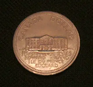 I’ve got a shiny, lightly‑circulated 1973 PEI Centennial dollar (1873-1973) if you’re open to a trad...