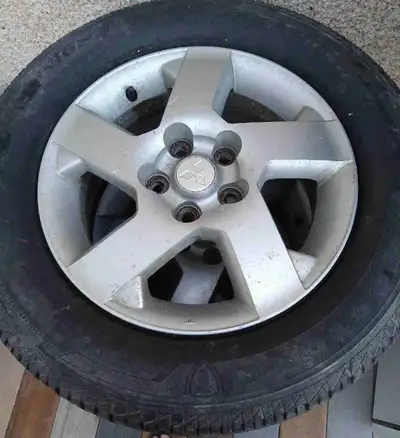 Up for sale is a set of four used Greek Touring A/S car tires, size 225/60R16 98T, mounted on Mitsub...