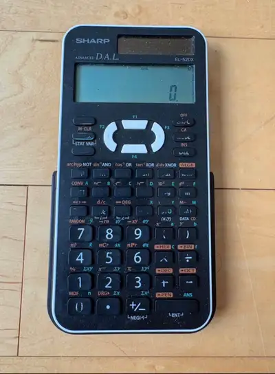 Reliable SHARP EL-520X scientific calculator. Has advanced D.A.L. logic. Good for school or college...