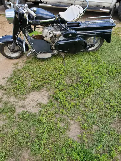2 Vintage Cushman Scooters.. 1 - 1958 Super Silver Eagle. (Black) 6499 Miles.. 2 - 1957 Eagle. (Whit...