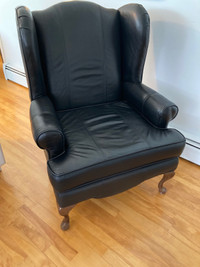 Black genuine leather wingback chair in excellent condition 