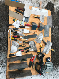Drywall and tile trowels and tools.