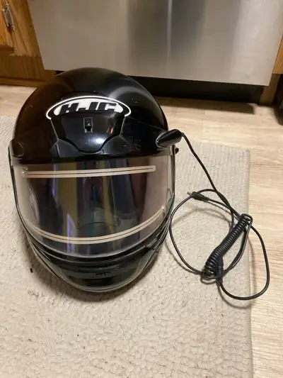 This is a used HJC CS-AIR snowmobile helmet in black, size XL , equipped with an electric shield . T...