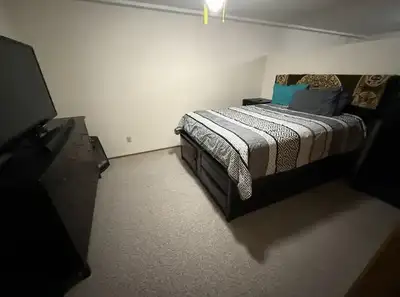 Central Kelowna area by Costco, Freshco Wine & Beyond. Bus stops near by Large bedroom downstairs in...