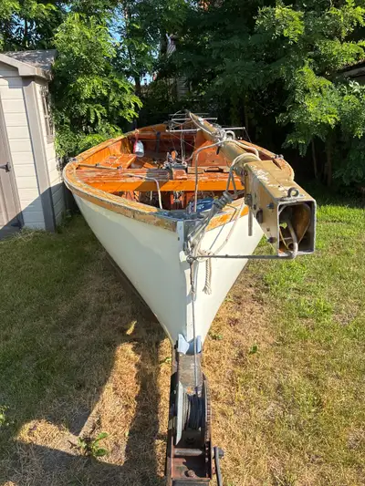 Old wooden thistle in good shape. No leaks. Only minor cosmetic stuff. Floats and sails fine