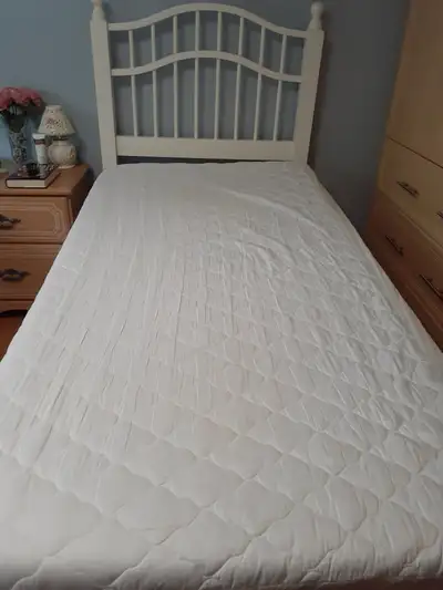 Single extra long twin bed, 39 inches wide by 81 inches long comes with headboard, boxspring, bedfra...