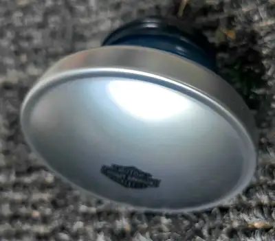 Original screw on cap for Harley Davidson sportster; only had 4000 km on it; small dent when it fell...