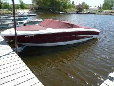 This is a great boat for summer fun complete with a bimini top. Included is a dual axle Easyloader t...