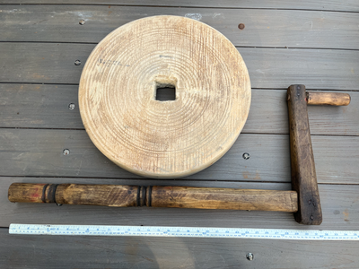 Antique 18" by 2 1/2" square holed grinding wheel, View more