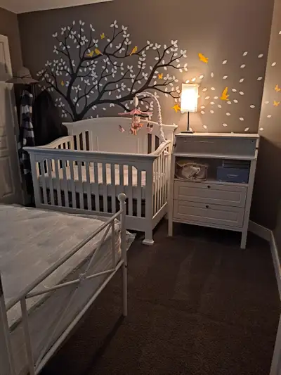 Beatiful solid wood convertible crib & toddler bed. It has a couple minor imperfections that could e...
