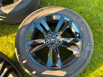 Set of 4 18” aluminum rims with gloss black finish. OEM Continental ProContact 255 45 r18 tires moun...