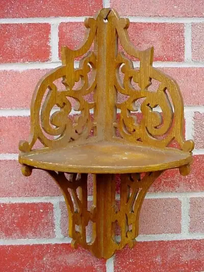 Antique fret wooden corner shelf, View more