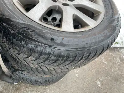 Selling a set of used 235/60R18 winter tires on Mazda rims. These tires have seen a few winters, so...